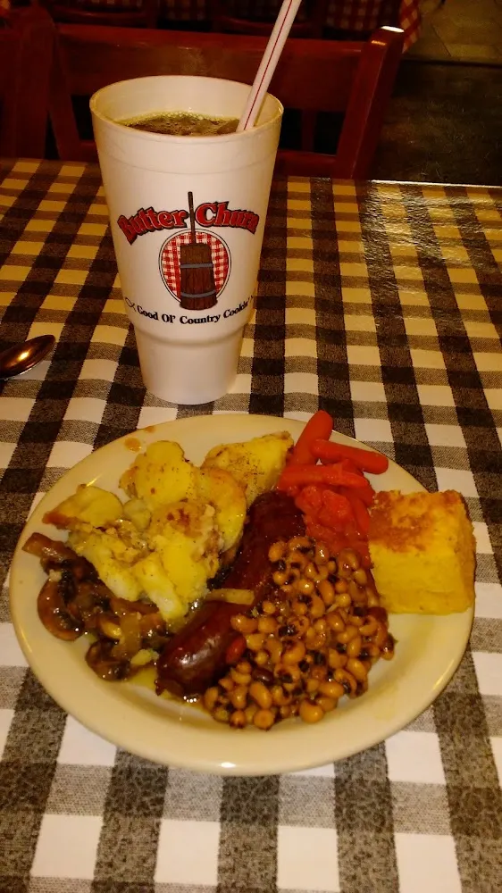 Sausage Links Mashed Potatoes Carrots Corn Bread and Black Eyed Peas